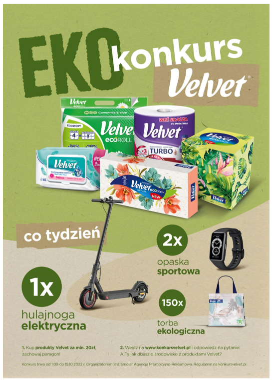 Plakat Eko konkursu Velvet przedstawiający produkty Velvet (papier toaletowy, chusteczki, ręcznik papierowy) oraz nagrody przyznawane co tydzień (hulajnoga elektryczna, opaska sportowa, torba ekologiczna)